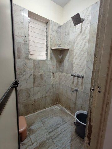 Bathroom in 1 BHK Apartment at Kadamba CHS LTD, Pokhran Road No Two – for Rent