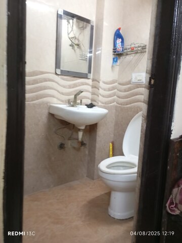 Bathroom in 2 BHK Builder Floor at Esteem Complex, Savitri Nagar – for Sale