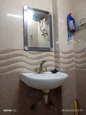 Bathroom in 2 BHK Builder Floor at Esteem Complex, Savitri Nagar – for Sale
