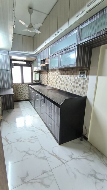 Kitchen in 3 BHK Apartment at Om Heights Dadar, Dadar West – for Rent