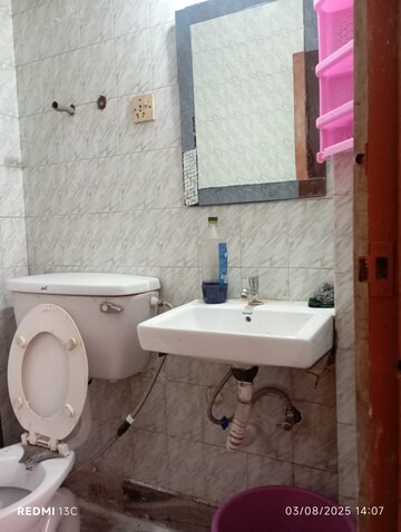 Bathroom in 1 BHK Builder Floor at Esteem Complex, Savitri Nagar – for Rent