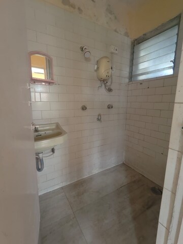 Bathroom in 1 BHK Apartment at New Harvard Garden Chs, Manpada – for Rent