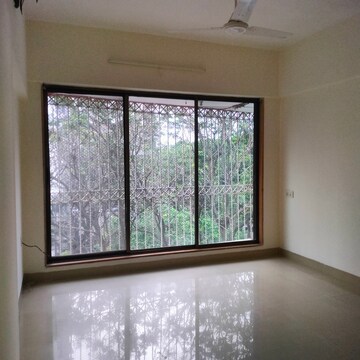 Bedroom in 2 BHK Apartment at Juhu Natraj CHS, Vile Parle West – for Rent