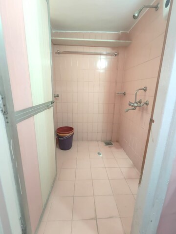 Bathroom in 1 BHK Apartment at Himgiri Lokupvan Phase II CHS Ltd, Vasant Vihar – for Rent
