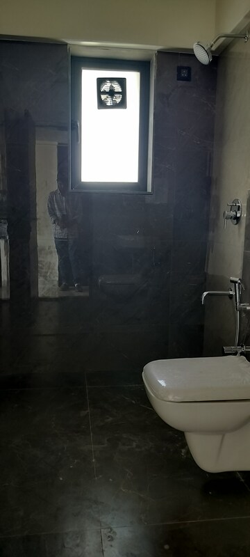 Bathroom in 3 BHK Apartment at Zindagi CHS, Khar West – for Rent