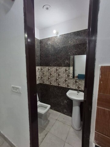 Bathroom in 2 BHK Builder Floor at Sharma Apartments Burari, Burari – for Rent