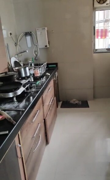 Kitchen in 3 BHK Apartment at Cosmos Horizon, Thane West – for Rent