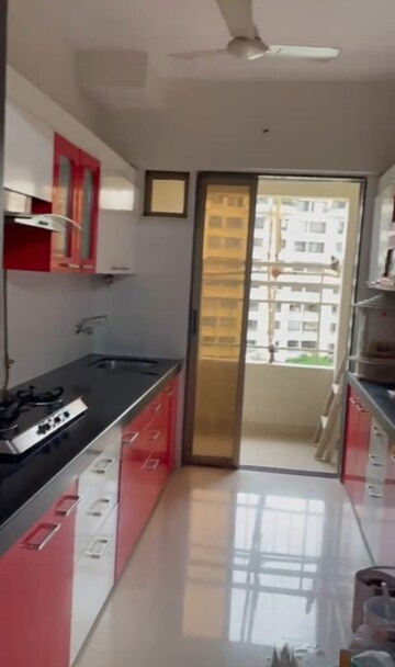 Kitchen in 2 BHK Apartment at Hyde Park Galaxy, Manpada – for Rent
