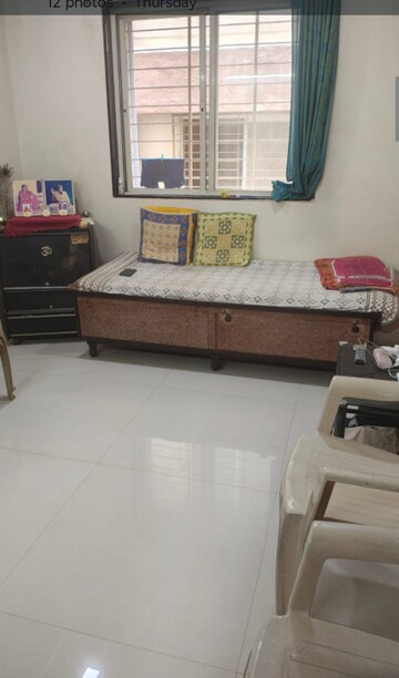 Living Room in 1.5 BHK Apartment at Gujrat Colony – for Sale