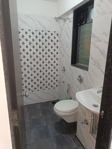 Bathroom in 1 BHK Apartment at UK Iridium, Kandivali East – for Rent