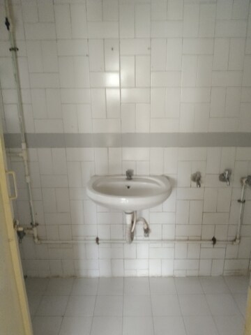 Bathroom in 2 BHK Apartment at Jagdish Nagar CHS, Aundh – for Rent