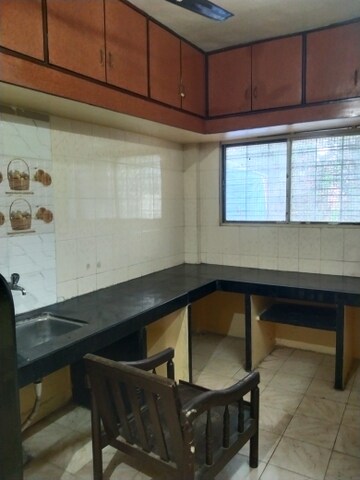 Kitchen in 1 BHK Apartment at Shivaji CHS, Gokhalenagar – for Rent