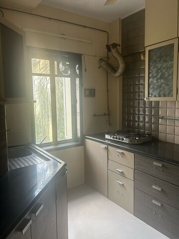 Kitchen in 2 BHK Apartment at Hibiscus CHS Versova, Versova – for Rent