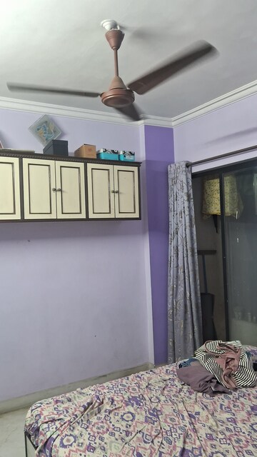 Bedroom in 2 BHK Apartment at Progressive Amber CHS, Kopar Khairane – for Rent