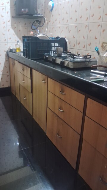 Kitchen in 2 BHK Apartment at Progressive Amber CHS, Kopar Khairane – for Rent