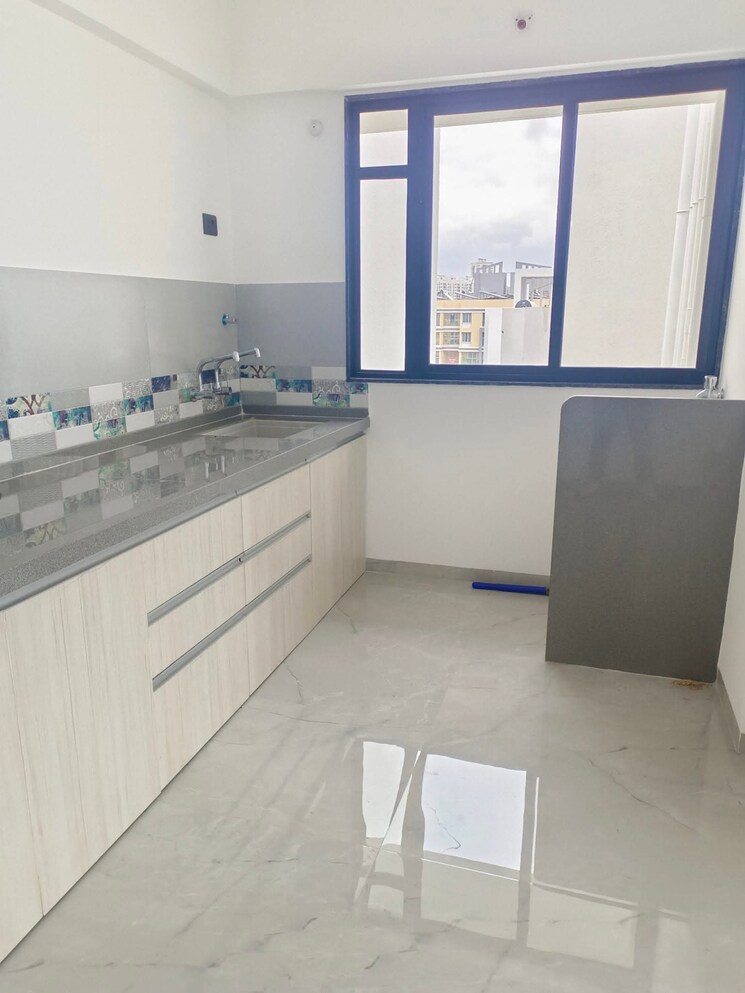 Kitchen, unique-youtopia 2 Bedroom 765 Sq.Ft. Apartment In Kharadi Pune 9032322