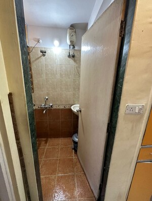 Master Bedroom in 1 BHK Apartment at Lodha Paradise, Majiwada – for Sale