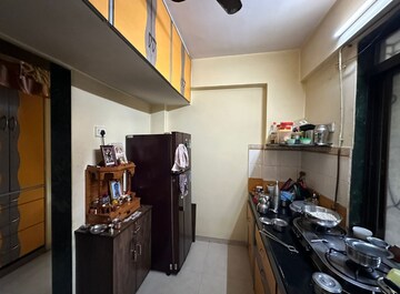 Kitchen in 1 BHK Apartment at Lodha Paradise, Majiwada – for Sale