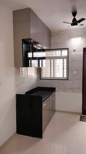 Kitchen in 2 BHK Apartment at Veddant Ganesh Bella Rossa Phase 2, Punawale – for Rent