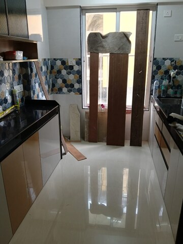Kitchen in 2 BHK Apartment at Colo Color Rise, Dadar West – for Rent
