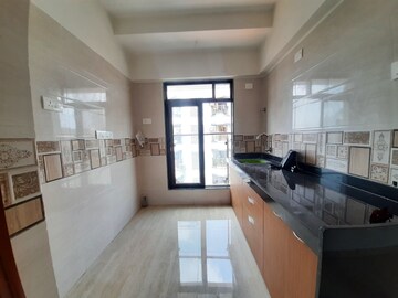 Kitchen in 1 BHK Apartment at Je and Vee Vrindavan, Malad East – for Sale