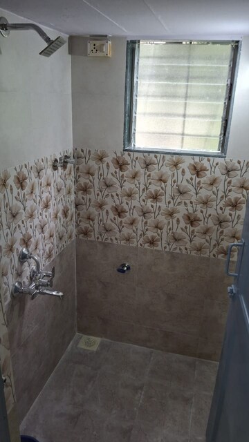 Bathroom in 1 BHK Apartment at RNA NG Paradise, Mira Road – for Rent