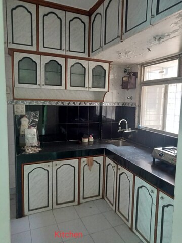 Kitchen in 2 BHK Apartment at Gaurav Valley, Mira Road – for Rent
