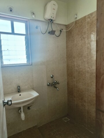 Bathroom in 2 BHK Apartment at Manav Silver Skyscapes, Wakad – for Rent