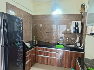 Kitchen in 2 BHK Apartment at Manav Silver Skyscapes, Wakad – for Rent
