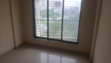 Room in 2 BHK Apartment at DB Orchid Ozone, Dahisar East – for Rent