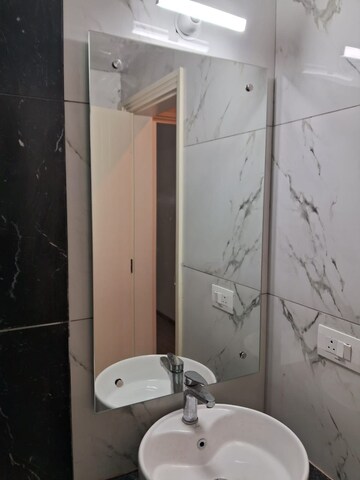 Bathroom in 2.5 BHK Builder Floor at Central Park Cerise Suites, Sohna Sector 33 – for Sale