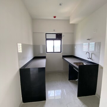 Kitchen in 1 BHK Apartment at Runwal Gardens Phase 2, Kalyan Shilphata Road – for Rent