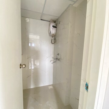 Bathroom in 1 BHK Apartment at Runwal Gardens Phase 2, Kalyan Shilphata Road – for Rent