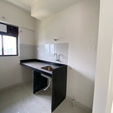 Kitchen in 1 BHK Apartment at Runwal Gardens Phase 2, Kalyan Shilphata Road – for Rent