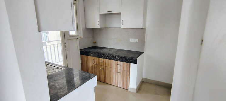 Kitchen, sikka-karnam-greens 2 Bedroom 990 Sq.Ft. Apartment In Sector 143b Noida 9033162