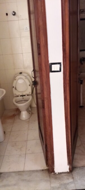 Bathroom in 2 BHK Apartment at RWA Apartments Sector 26, Sector 26 – for Sale