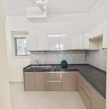 Kitchen in 3 BHK Apartment at Shapoorji Pallonji Alpine, Singh Agri Estate – for Rent