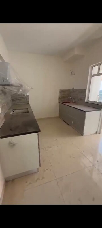 Kitchen in 3 BHK Apartment at Shapoorji Pallonji Joyville Phase 2, Sector 102 – for Sale