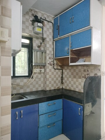 Kitchen in 1 BHK Apartment at New Jay Palace, Yari Road – for Rent