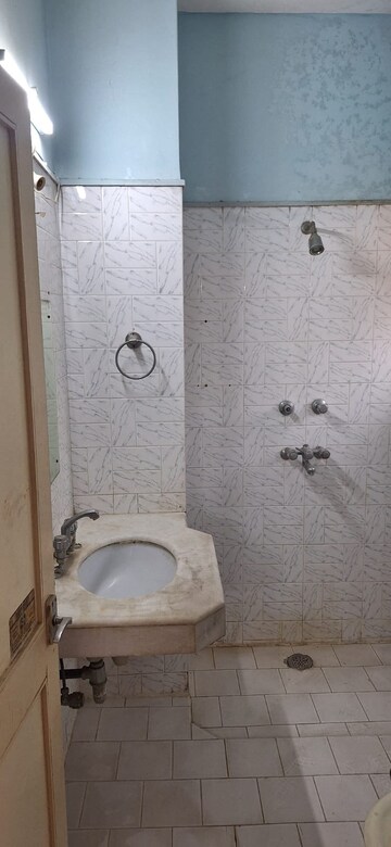 Bathroom in 3 BHK Apartment at Smiriti Apartment, Sector 56 – for Sale