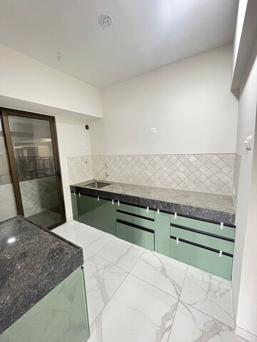 Kitchen in 2 BHK Apartment at Rahul Aston, Hinjewadi – for Rent