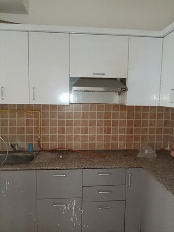 Kitchen in 3 BHK Apartment at Mahagun Mywoods, Sector 16c Greater Noida – for Rent