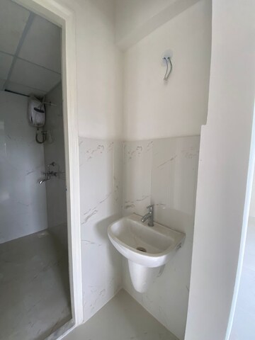 Bathroom in 1 BHK Apartment at Runwal Gardens Phase I, Dombivli East – for Rent