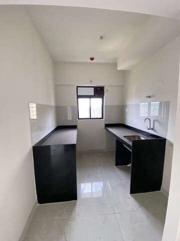 Kitchen in 1 BHK Apartment at Runwal Gardens Phase I, Dombivli East – for Rent