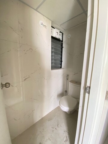 Bathroom in 1 BHK Apartment at Runwal Gardens Phase I, Dombivli East – for Rent