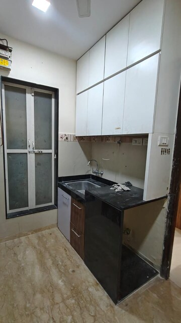 Kitchen in 1 BHK Apartment at Godrej Serenity, Chembur – for Rent