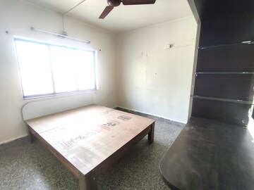 Bedroom in 2 BHK Apartment at Nirman Nisarga, Bhusari Colony – for Rent
