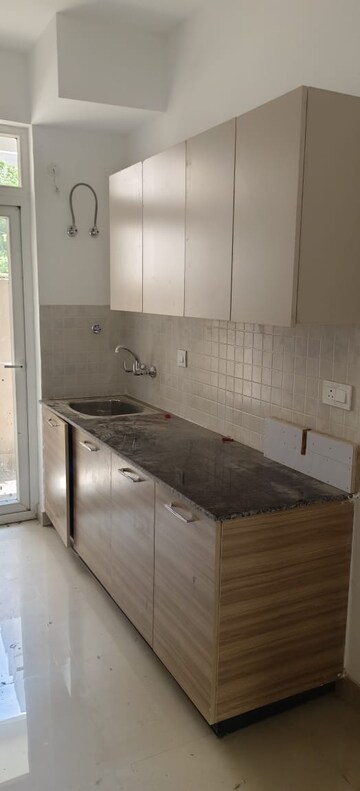 Kitchen in 3 BHK Apartment at ATS Nobility, Sector 4 Greater Noida – for Rent