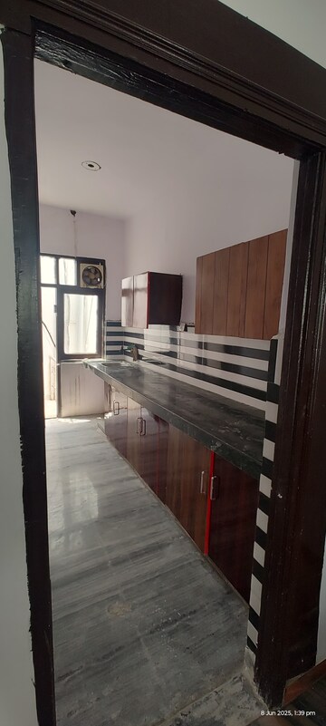 Kitchen in 2 BHK Apartment at Gaur City 2 - 14th Avenue, Sector 16c Greater Noida – for Rent