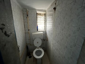 Bathroom in 2 BHK Apartment at Mamta CHS Wadala, Wadala – for Sale
